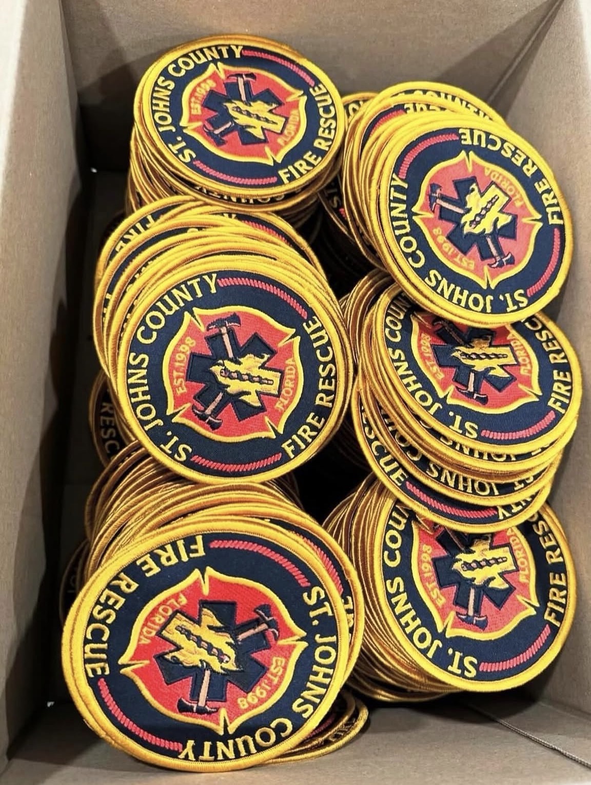 St. Johns County Fire Rescue patches packed in box